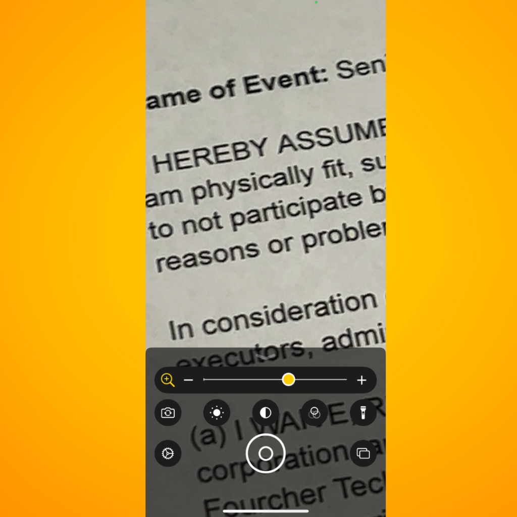 Screenshot of the Magnifier feature on an iPhone, showing the interface used to enlarge text and objects.